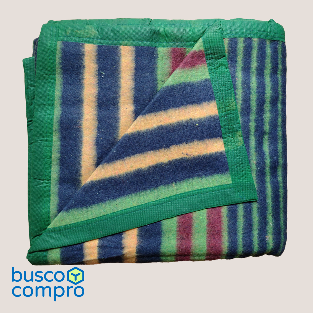Frazada Campolindo / 1 1/2 plaza / New Silver / Marca: Doral / Tonos: verde, azul, rojo y amarillo.